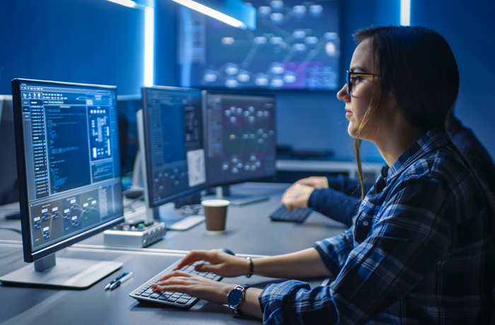 woman working in a cybersecurity operations center