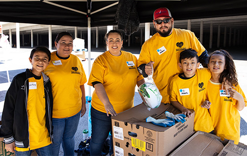 Our Rackers volunteering at our annual Thanksgiving food drive