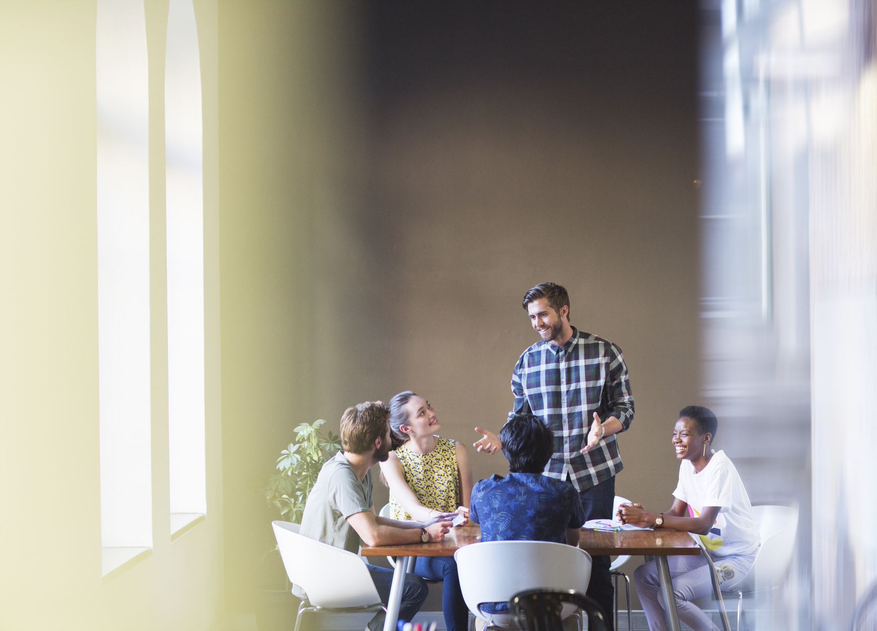 people having a meeting in a modern office